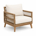 Poltrona da esterno in rattan con cuscini beige